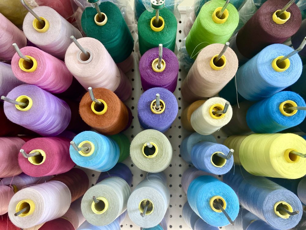 Colorful thread spools in the shop